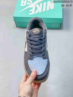 Top view of one sneaker showing the perforated light blue toe box, dark laces and Nike SB Force 58 tongue label.