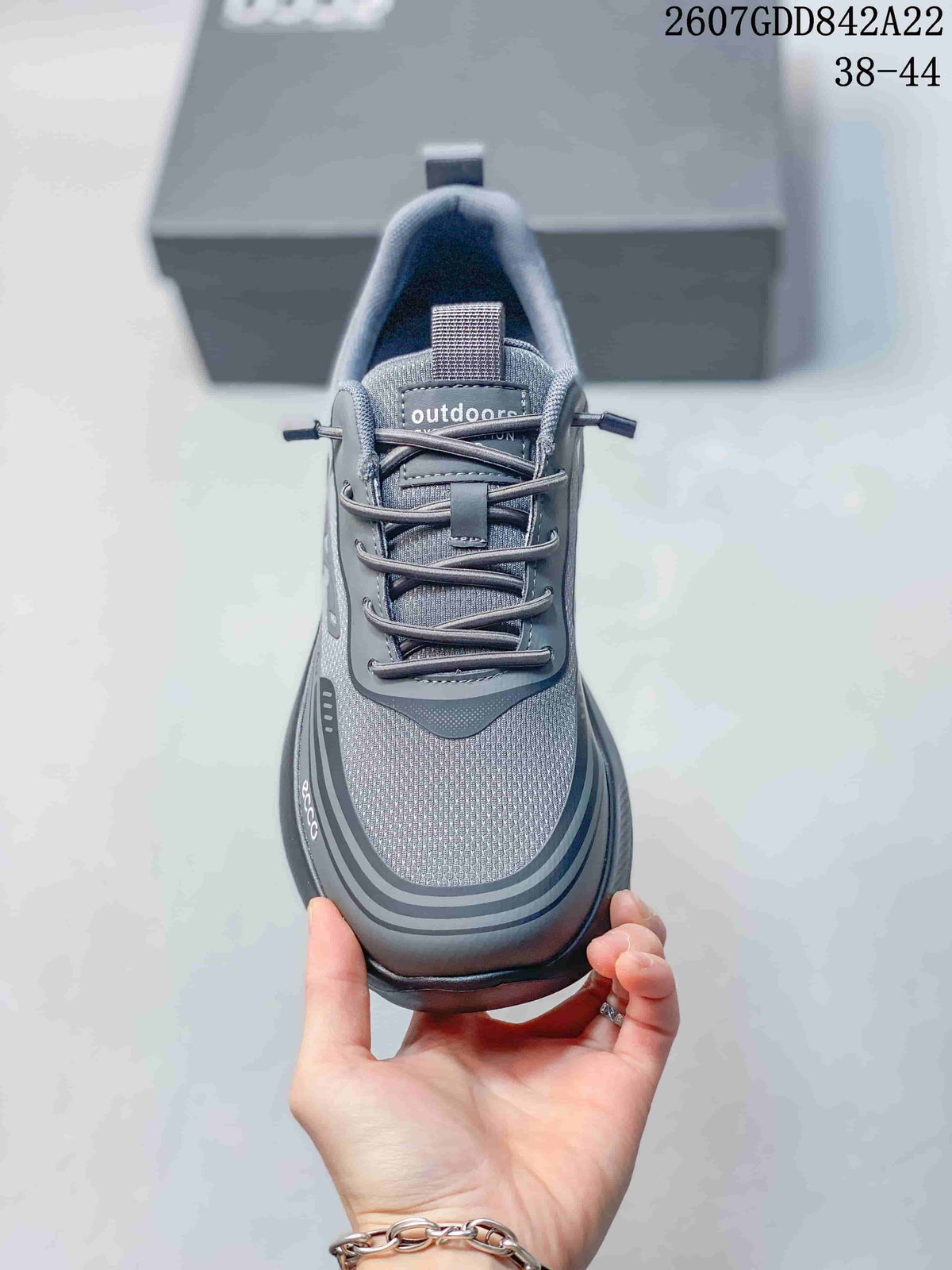 Top view of a gray ECCO sneaker showing the mesh-textured toe, lace system and padded tongue.