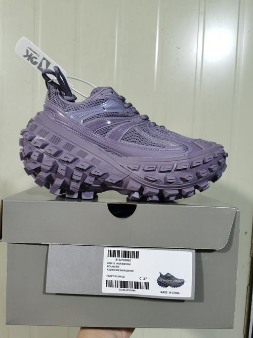 Faded purple 5500 Bouncer sneaker displayed on its box, with the W2RAM5500 label visible.