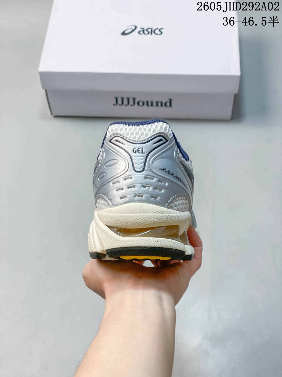 Rear view of the sneaker showing heel detailing and visible GEL branding