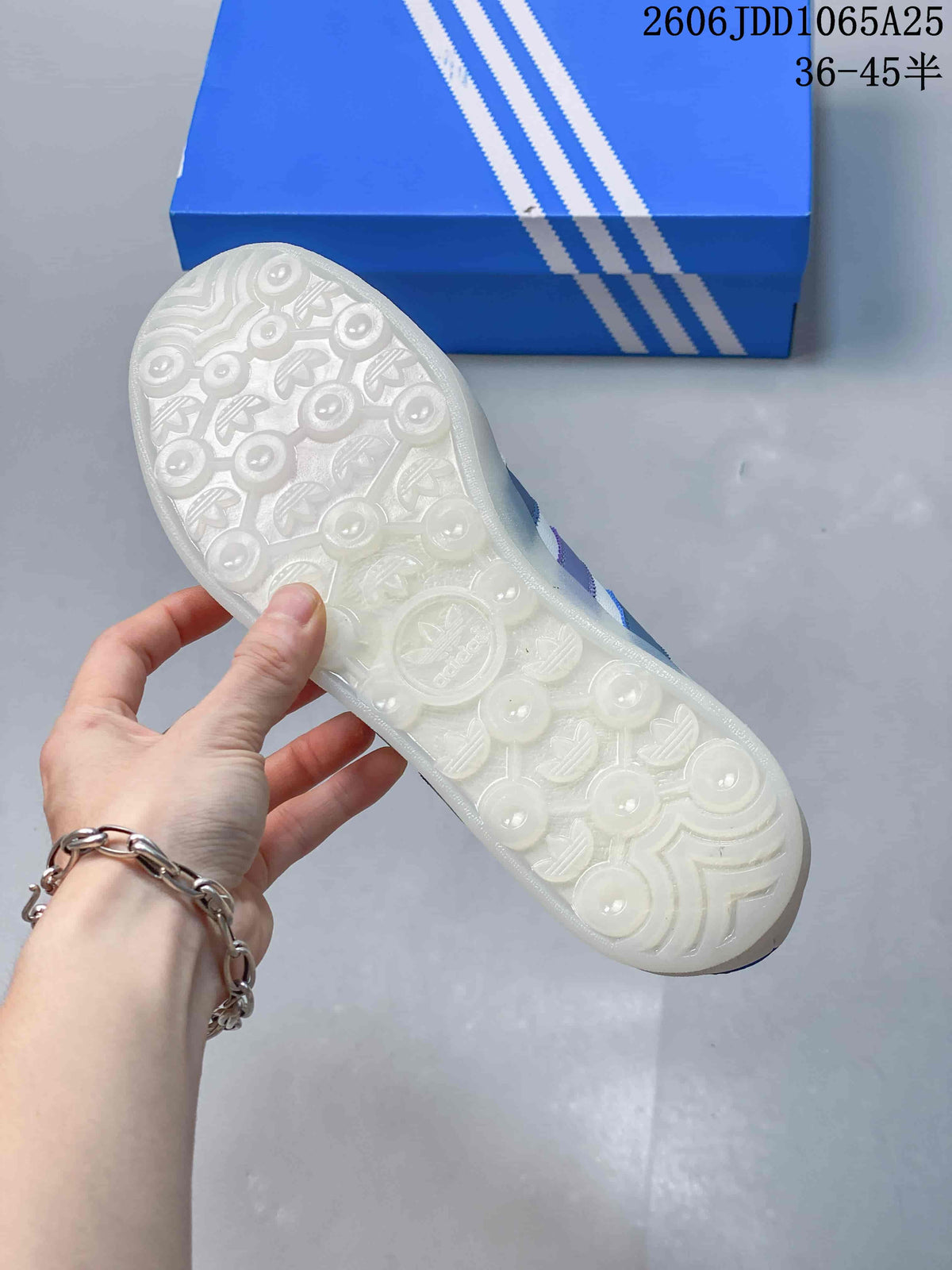 Close-up of the translucent textured outsole with circular and leaf-like tread details.
