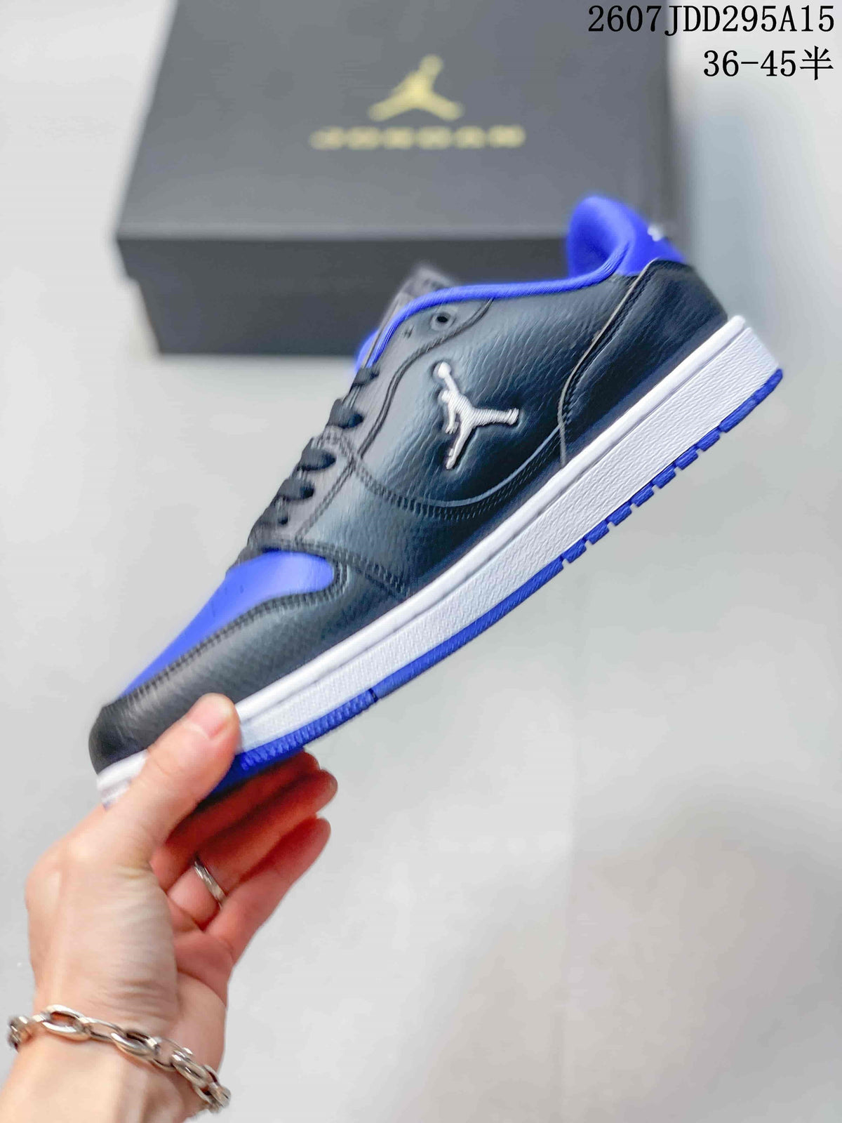 Side profile showing the black upper, blue toe area, white midsole, and blue outsole.