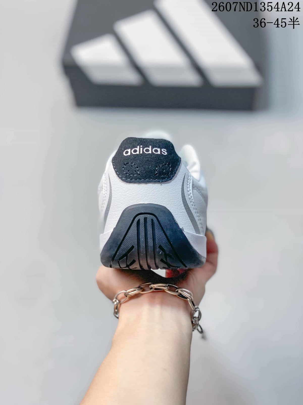 Rear view of the sneaker showing the adidas heel label and dark heel outsole.