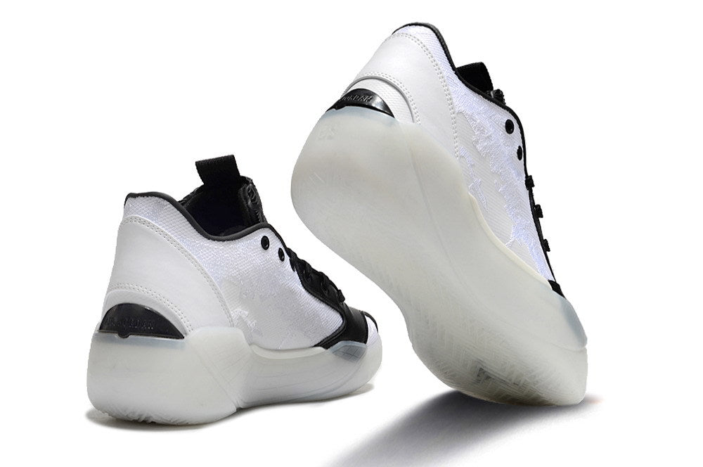 White and black Jordan Luka 39 shoes shown from the heel and outsole
