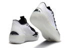 White and black Jordan Luka 39 shoes shown from the heel and outsole