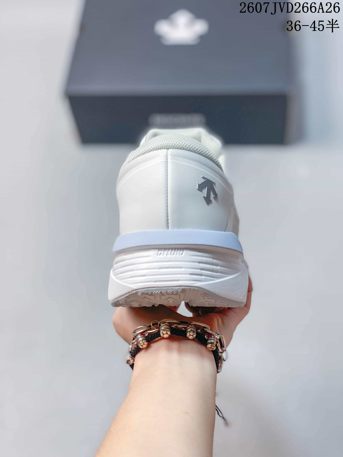 Rear view of the white sneaker showing the padded collar, heel branding, and layered sole.
