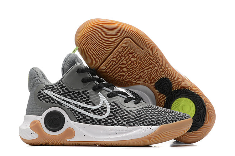 Gray and black basketball shoe with white midsole and gum-colored outsole accents.