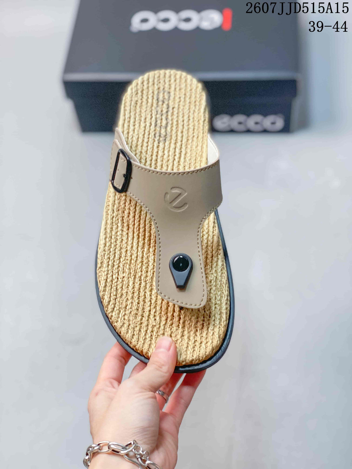 Top view showing the beige adjustable buckle strap and textured sandal footbed.