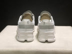 Rear view showing the padded collars, heel branding, and white sole structure.