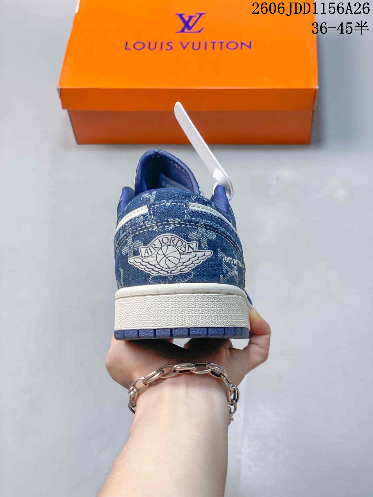 Rear view of the blue and white sneaker showing the Air Jordan winged-ball emblem, layered stitching, and a white midsole.