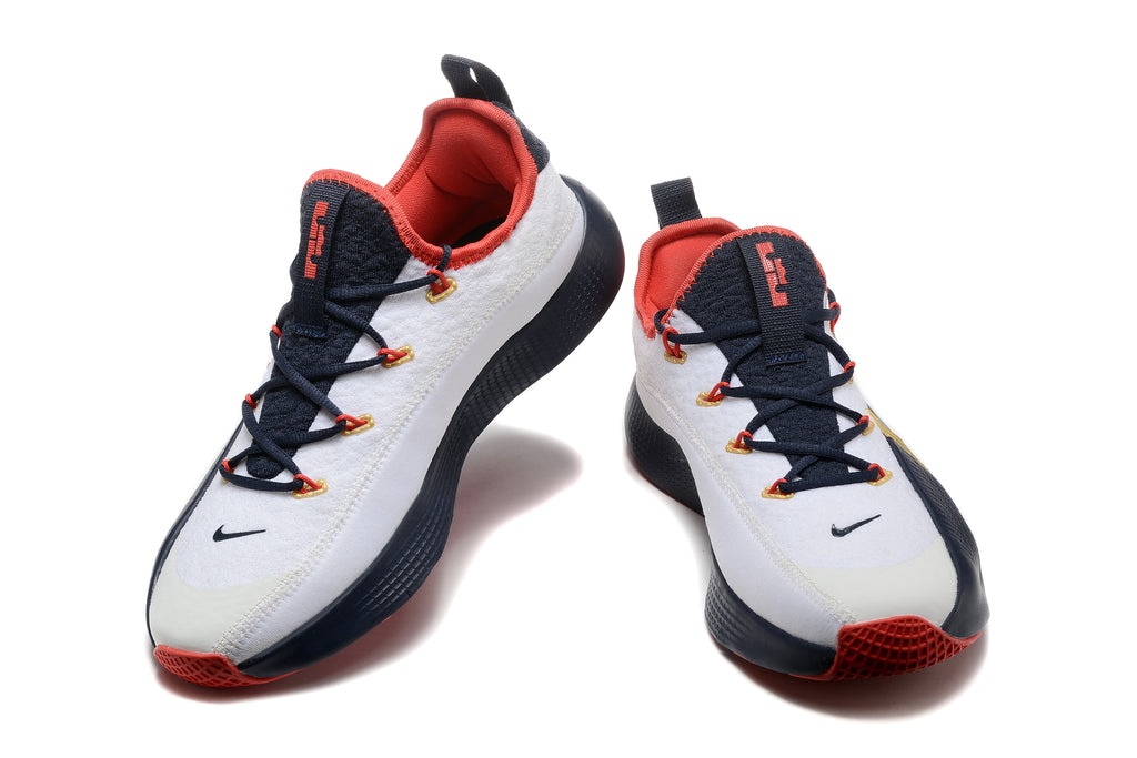 White, navy, red, and gold Nike LeBron TR1 shoes, front view