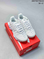 Pair of white Nike Air Max Plus sneakers displayed on a red Nike shoebox; style code 2607ND776A16 and size range 36–47 are overlaid.