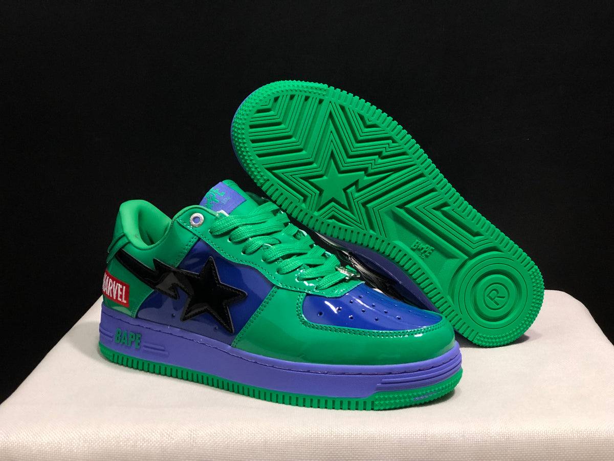 Angled view showing the green outsole with geometric tread, purple midsole and color-blocked upper.