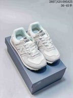 Pair of white and grey New Balance 574 sneakers displayed on a New Balance shoe box; image text shows style code 2607JGD1095A25 and size range 36–45.5.
