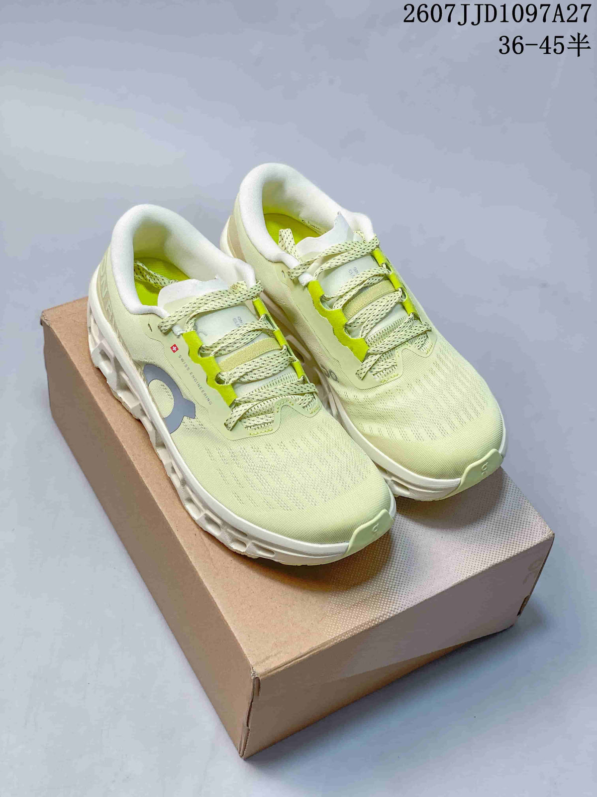 Pair of pale green On sneakers displayed on a shoebox, with the product code and advertised size range visible at the top.
