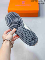 Close view of the dark rubber outsole showing circular traction rings, segmented tread blocks and embossed Nike branding.