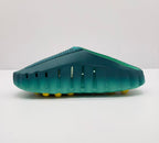 Opposite side view showing ventilation openings and the green molded slide construction.