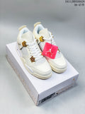 Pair of white and gold Nike Air Jordan 4 Retro sneakers displayed on a shoebox, with the style code and size range visible above.