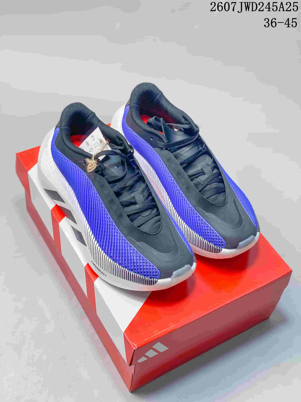Pair of black, purple and white Adidas Hyperboost Edge sneakers displayed on a red shoebox; image text shows 2607JWD245A25 and sizes 36–45.