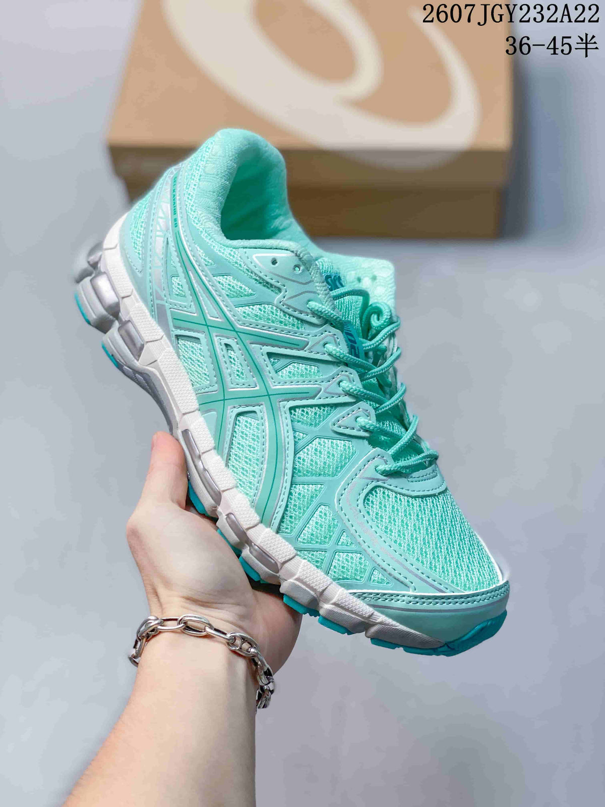 Angled side view highlighting the mint mesh upper, overlays, laces, and teal outsole.