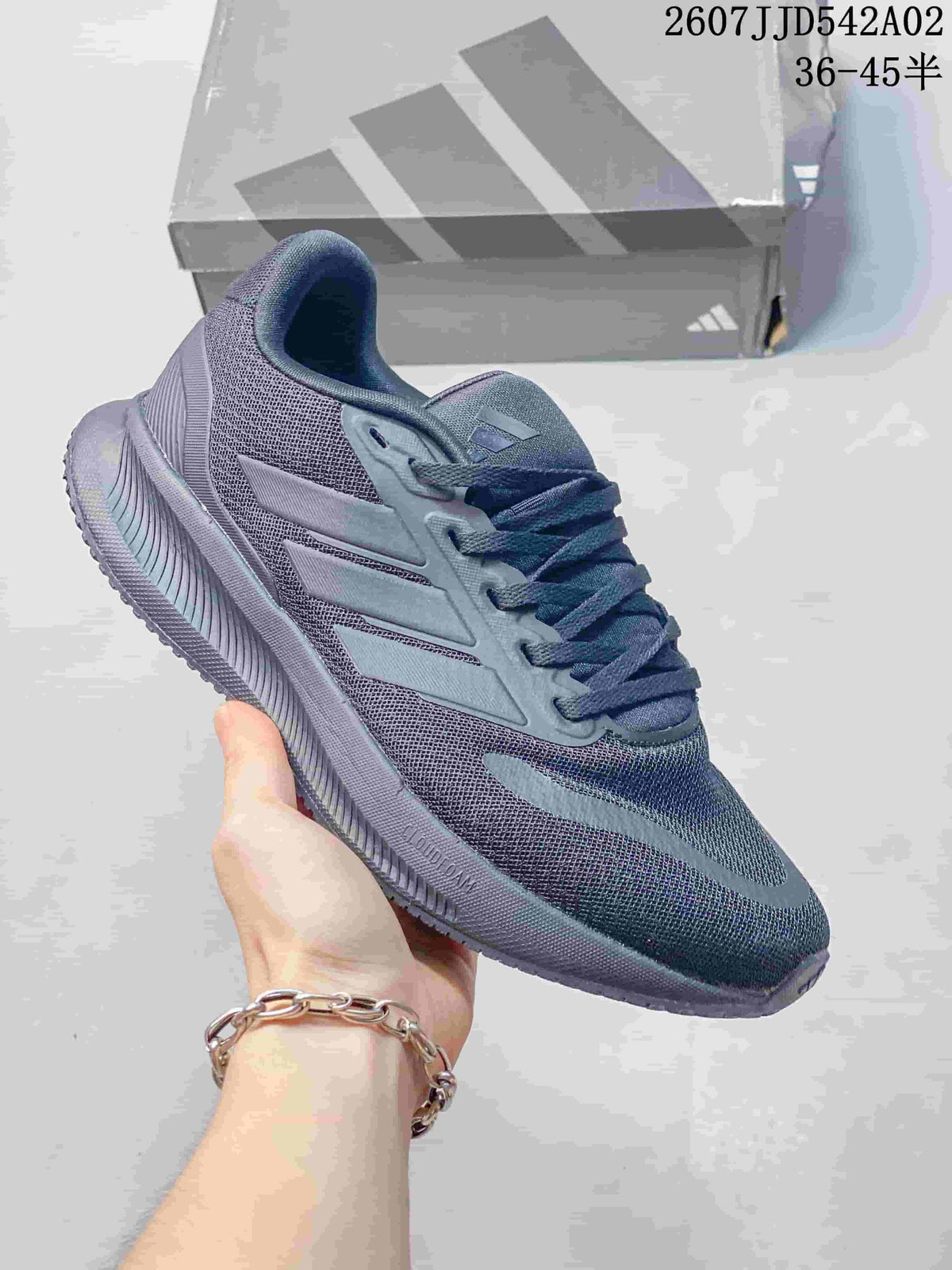 Gray adidas Runfalcon 5 shoe with muted side stripes and a white sole.