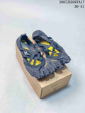 Pair of dark gray and yellow Vibram five-finger sneakers displayed on a shoebox; image text shows style code 2607JXD267A17 and size range 36–41.