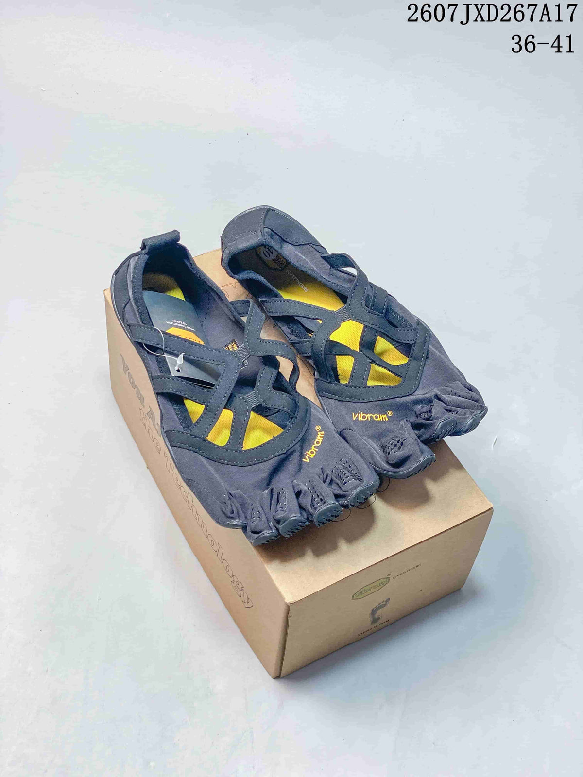 Pair of dark gray and yellow Vibram five-finger sneakers displayed on a shoebox; image text shows style code 2607JXD267A17 and size range 36–41.