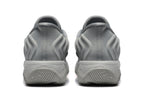 Rear view of the gray sneakers showing padded heels and sculpted soles
