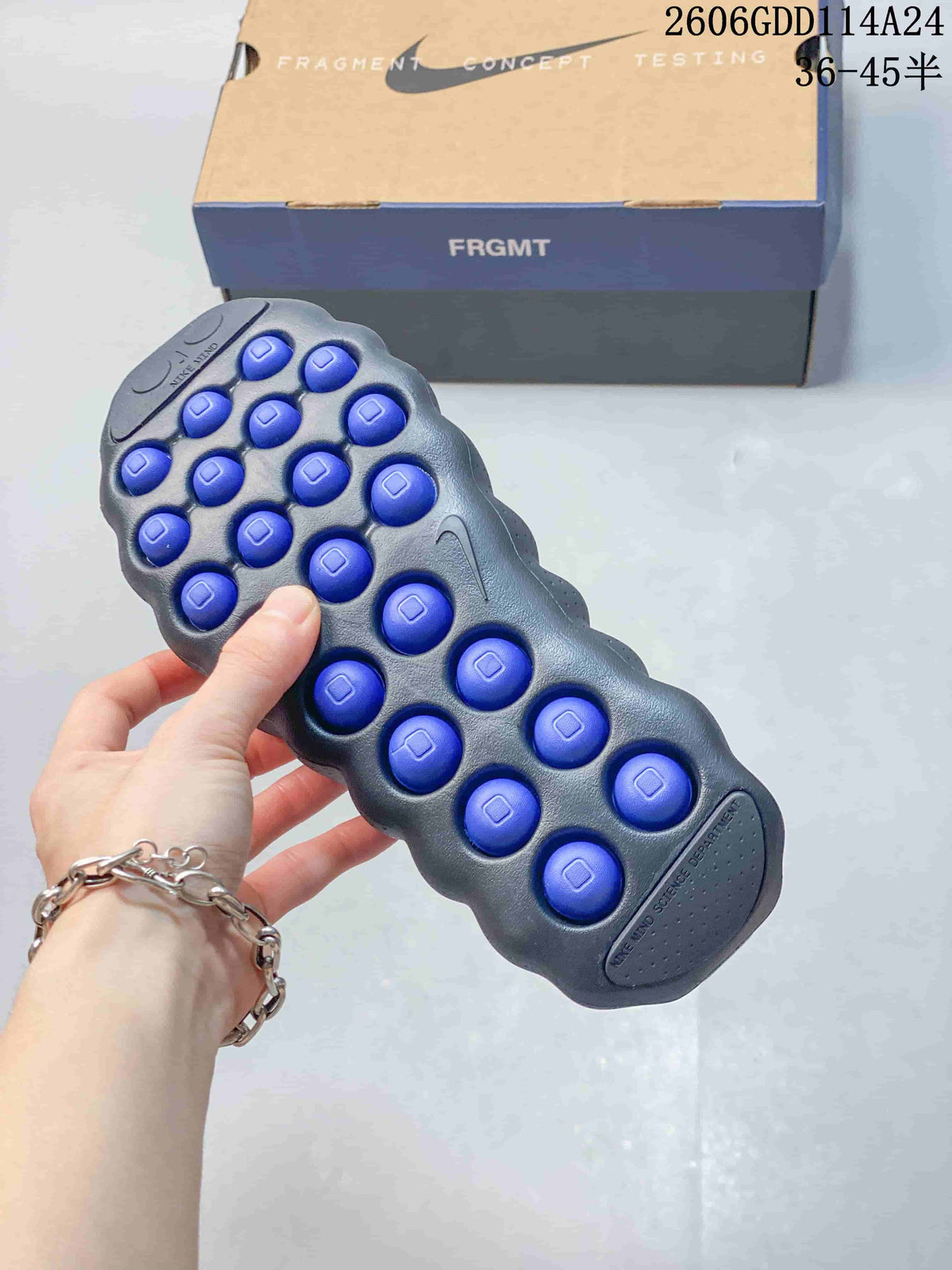 Outsole showing raised blue pod-like sections