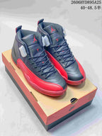 Pair of black and red Jordan Air Jordan 12 high-top sneakers on a shoe box