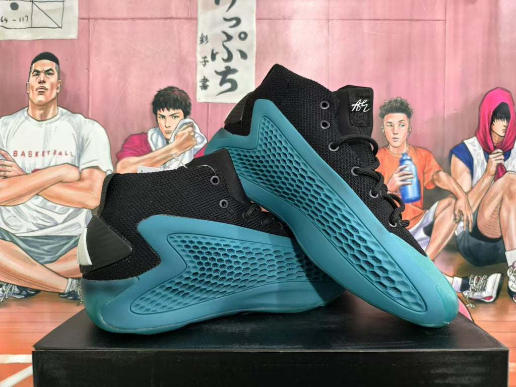 Pair of black high-top basketball shoes with teal textured side panels and sculpted soles, shown from the side.