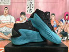 Pair of black high-top basketball shoes with teal textured side panels and sculpted soles, shown from the side.