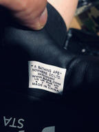 Close-up of the shoe label showing BAPE branding, US 8, UK 7, EU 41 and CM 26.