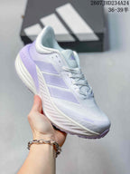 Angled side view showing the white and lavender upper, side branding, and cushioned-looking sole profile.
