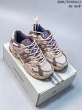 Pair of beige and taupe adidas Response CL sneakers with purple accents displayed on a Bad Bunny box
