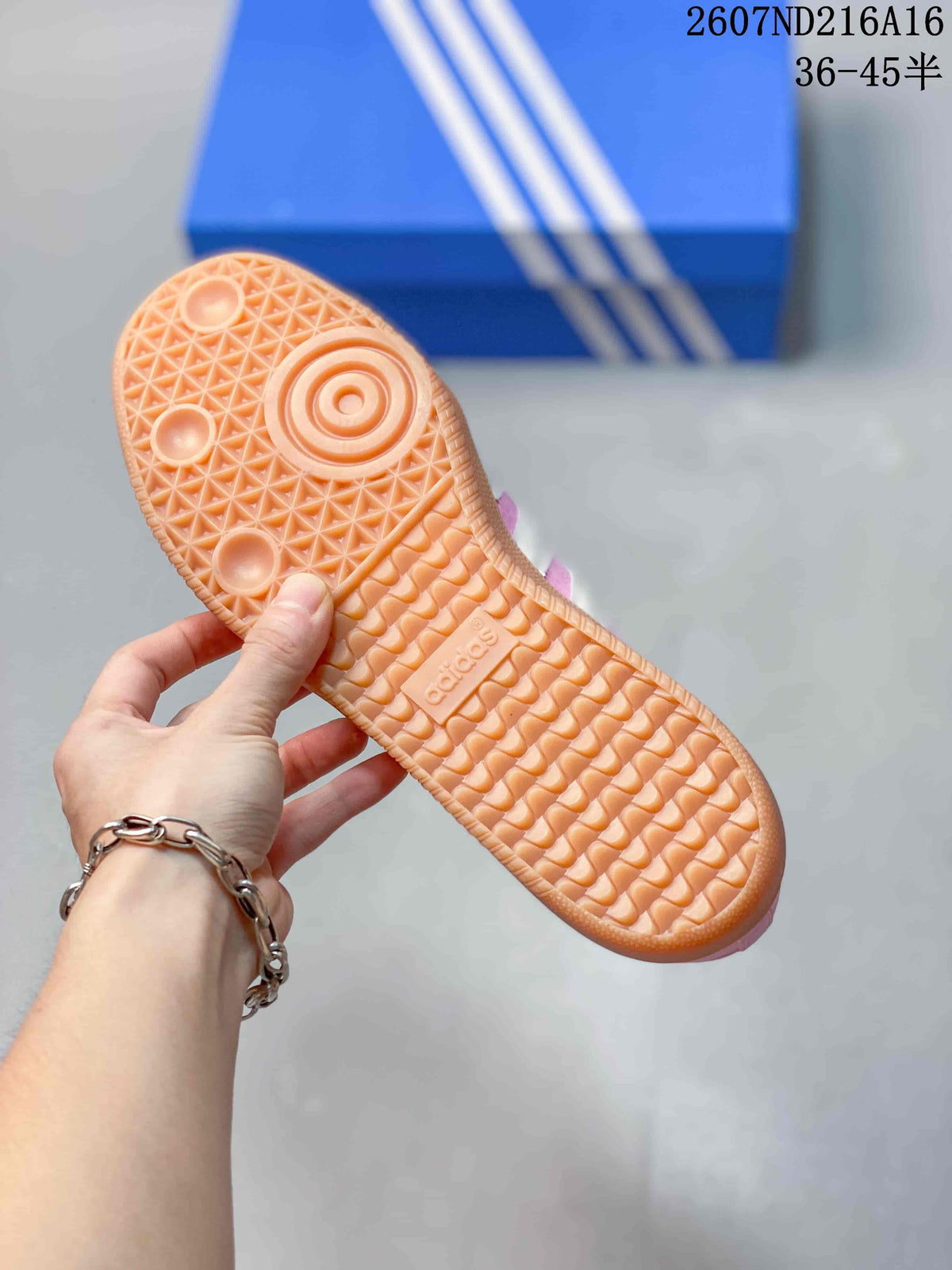 Close-up of the gum-colored outsole showing its textured tread pattern and circular traction details.