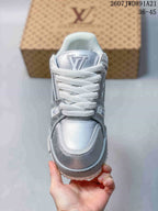 Top view of the sneaker showing the rounded toe, white laces, and branded tongue.