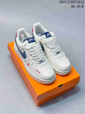 Pair of white Nike Air Force 1 '07 Low sneakers with navy and red accents displayed on an orange shoebox; overlay shows style code 2607JYD972A22 and size range 36–45.