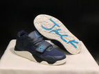 Jordan Jumpman Jack sneaker shown with the cream outsole lifted to display its textured tread pattern.