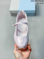 Top view showing the closed toe, glossy finish and adjustable front strap.