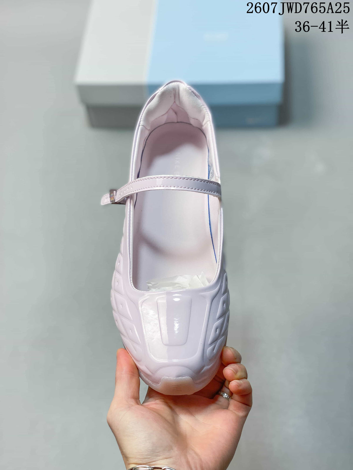 Top view showing the closed toe, glossy finish and adjustable front strap.