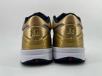 Rear view of both shoes with gold heel panels and the number 10 detail.