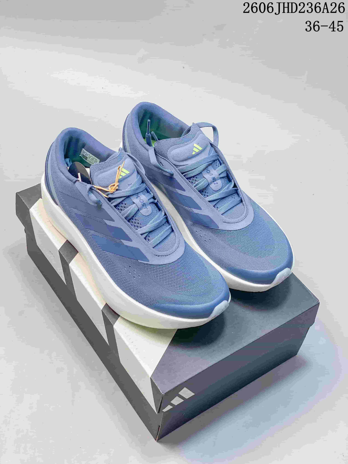 Pair of blue adidas ZenBoost low-top running shoes with white soles.