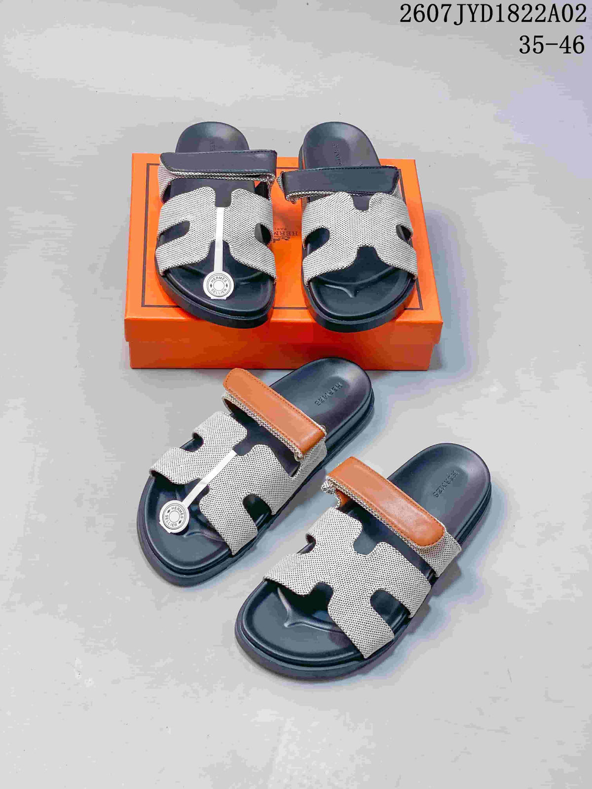 Dark and tan strap-accent colorways of Hermès Kazimir patterned slide sandals.