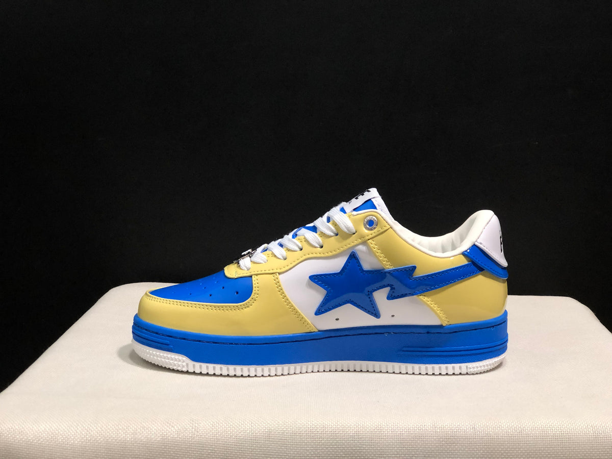 Side profile showing the blue star detail, yellow overlays, and layered sole