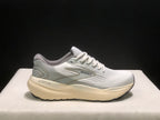 Single side profile of the white Brooks Glycerin 21 sneaker showing the Glycerin branding on the heel-side midsole.