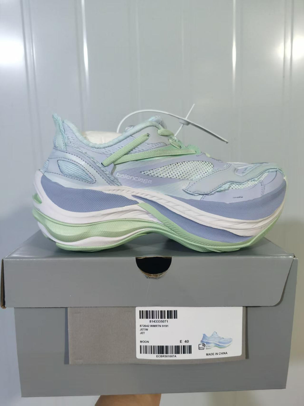 Balenciaga 9191 sneakers displayed on their box; the visible label shows Moon, size E 40, and the 9191 model code.
