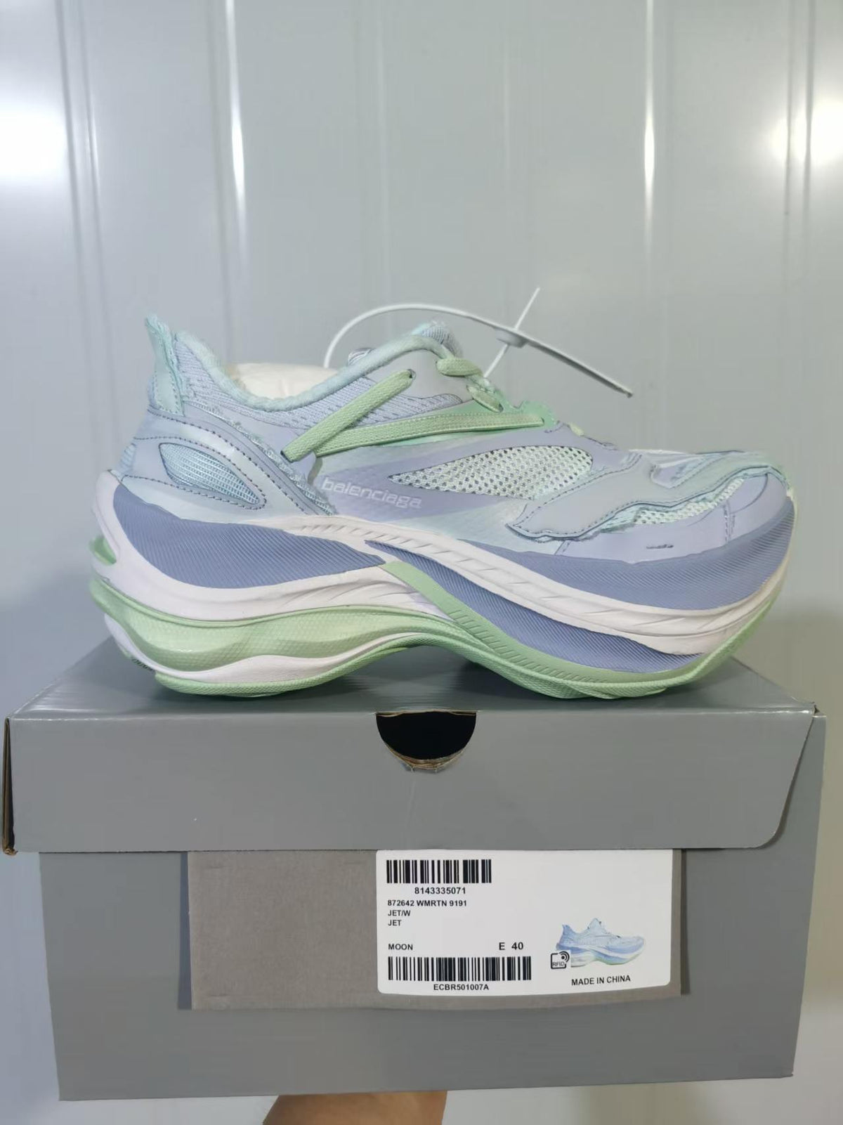 Balenciaga 9191 sneakers displayed on their box; the visible label shows Moon, size E 40, and the 9191 model code.