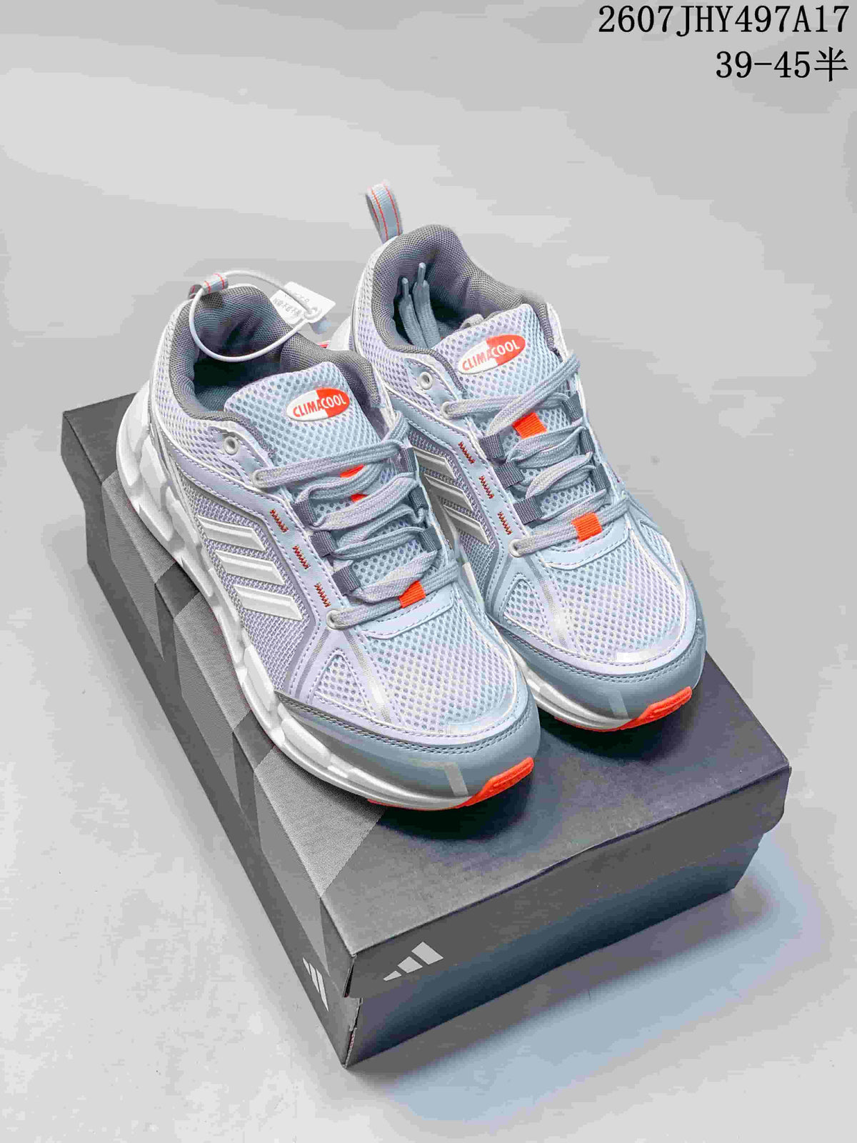 Pair of light gray Adidas Climacool running shoes displayed on a shoebox, showing orange accents and the style code overlay.