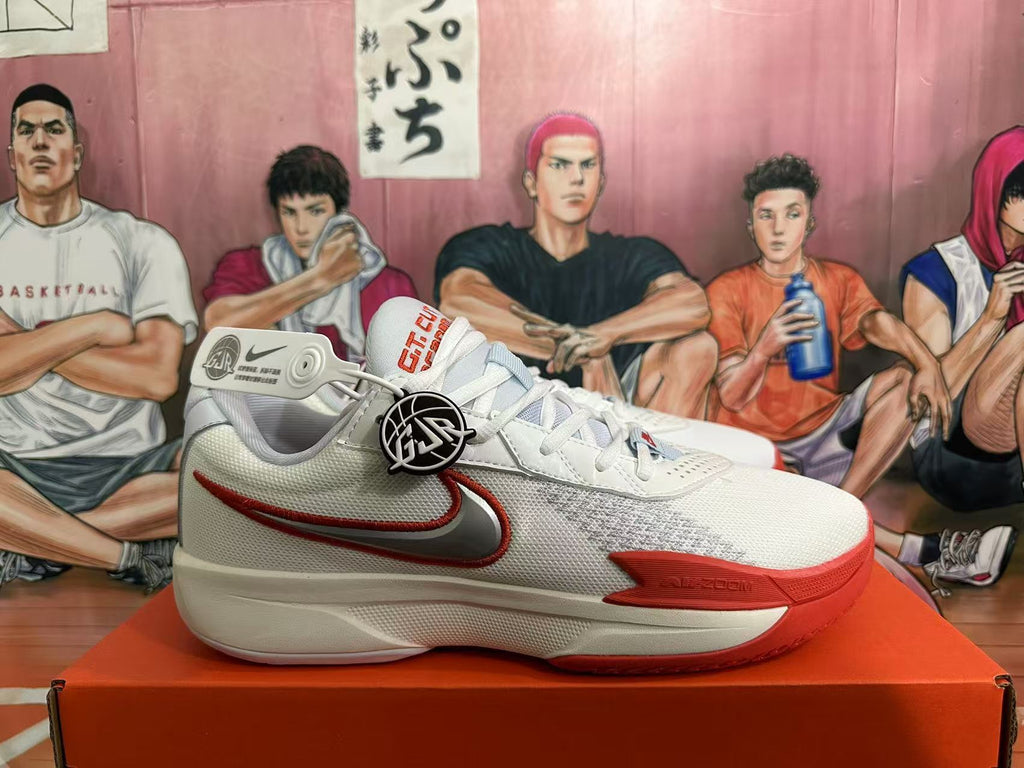 Side view of a white Nike GT Cut 3 basketball shoe with a silver and red Swoosh.